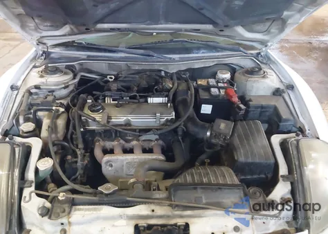 2000 Mitsubishi Eclipse Gs z USA, uszkodzony, nr VIN 4A3AC44G5YE128983